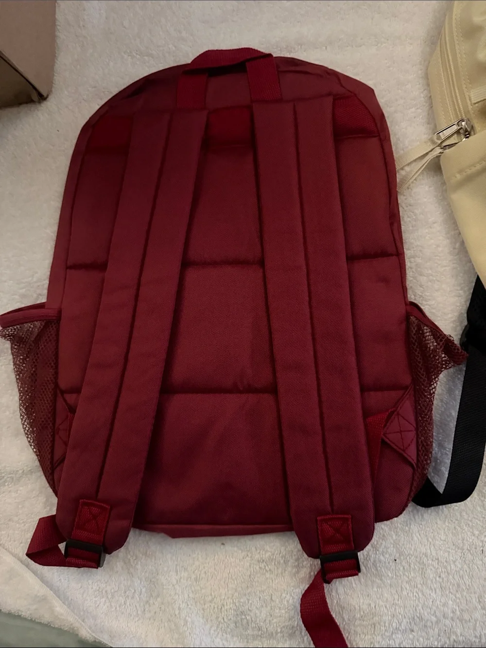 Beige and Burgundy Two Backpacks
